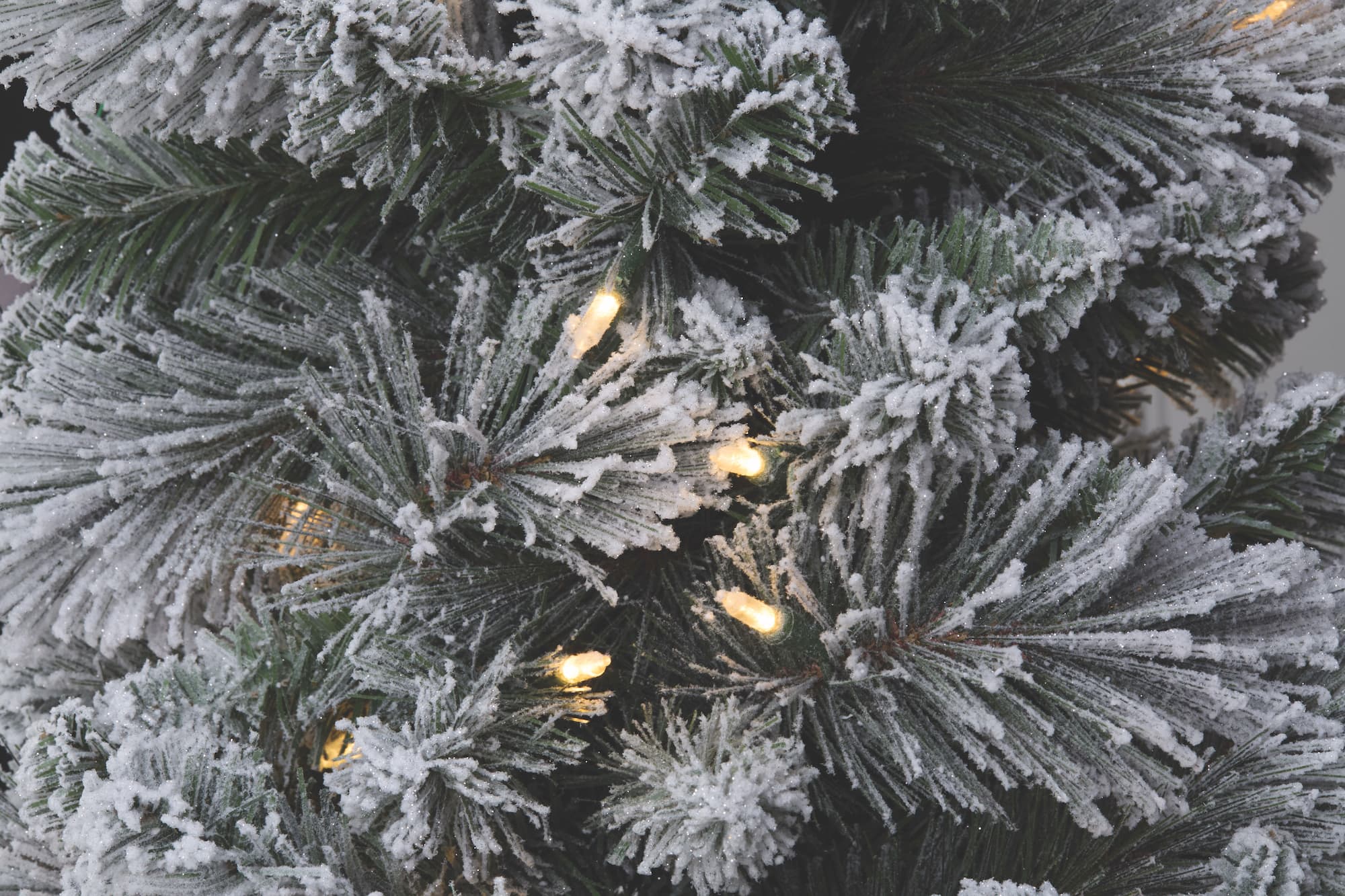 7ft. Pre-Lit Flocked Slim Artificial Christmas Tree, Warm White Twinkle LED Lights by Ashland®